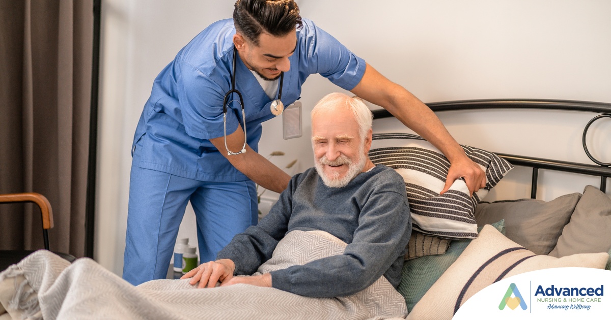 A home health care worker helps a patient in bed while both smile representing the results of a safe work habits.