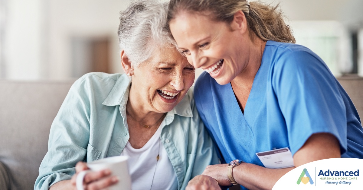 A caregiver laughs with a client representing how good social skills can help professional caregivers.