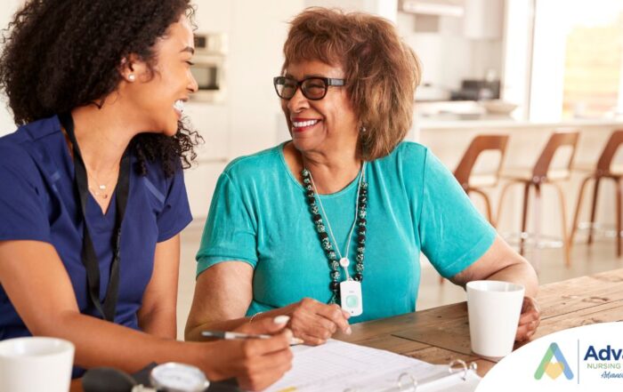 A care provider smiles with an older patient, representing the good results of speech therapy.