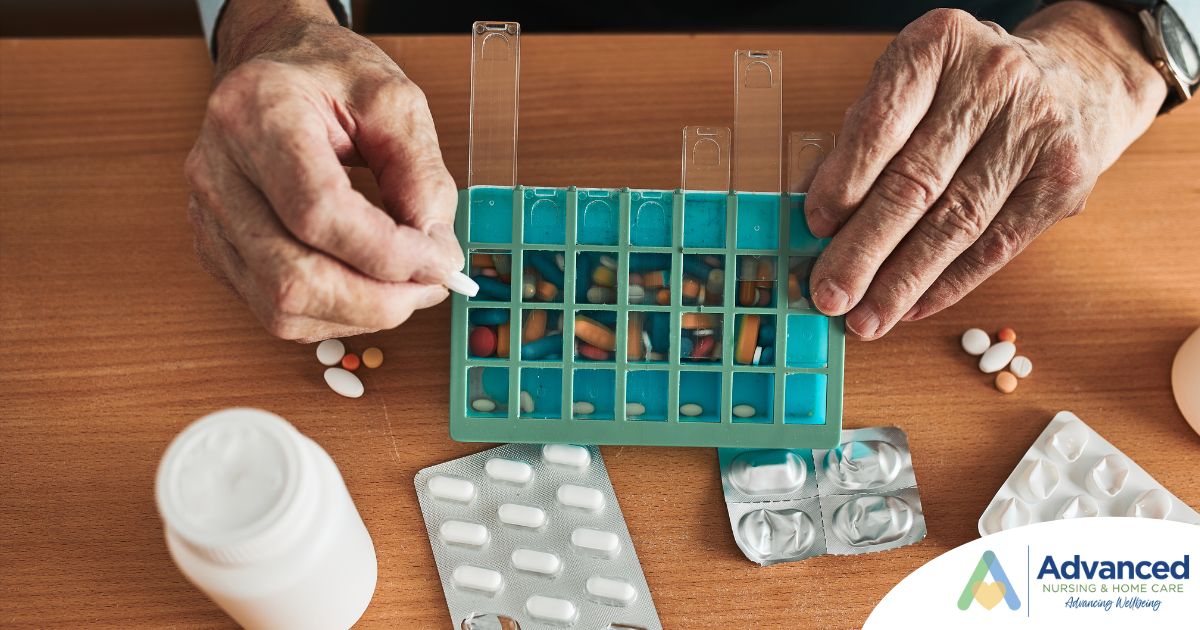An elderly person organizes pills in a weekly medication box, representing safe and reliable medication management support from Advanced Nursing & Home Care.