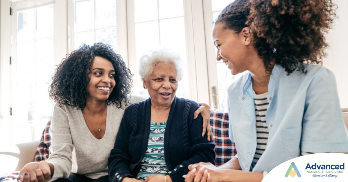 Caregiver talking to a family about Elderly Care