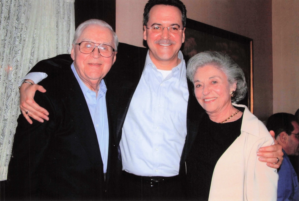Sam with his parents in 2004