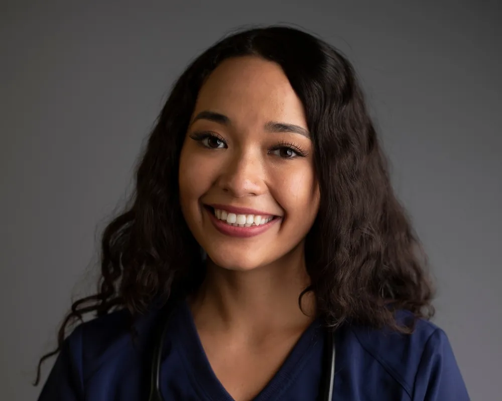 Friendly home care nurse portrait