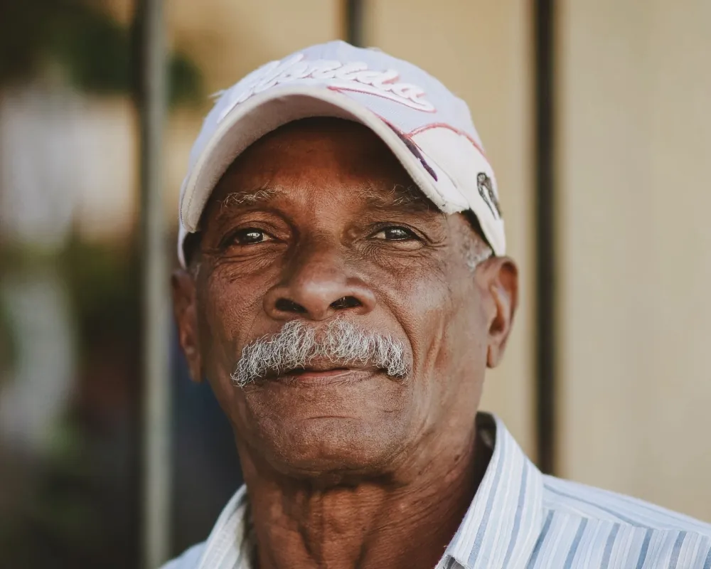 Senior veteran portrait in baseball cap