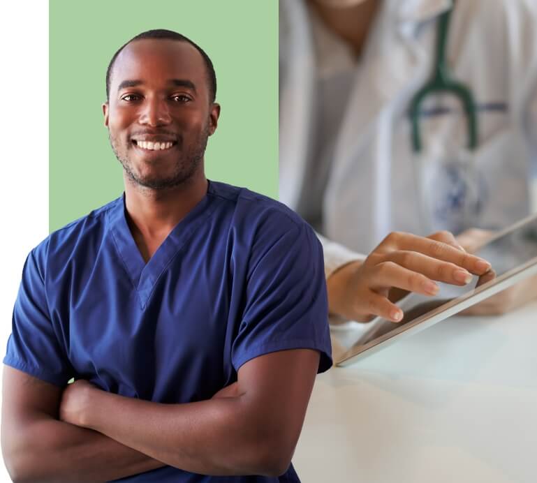 Nurse smiling and a doctor using a tablet