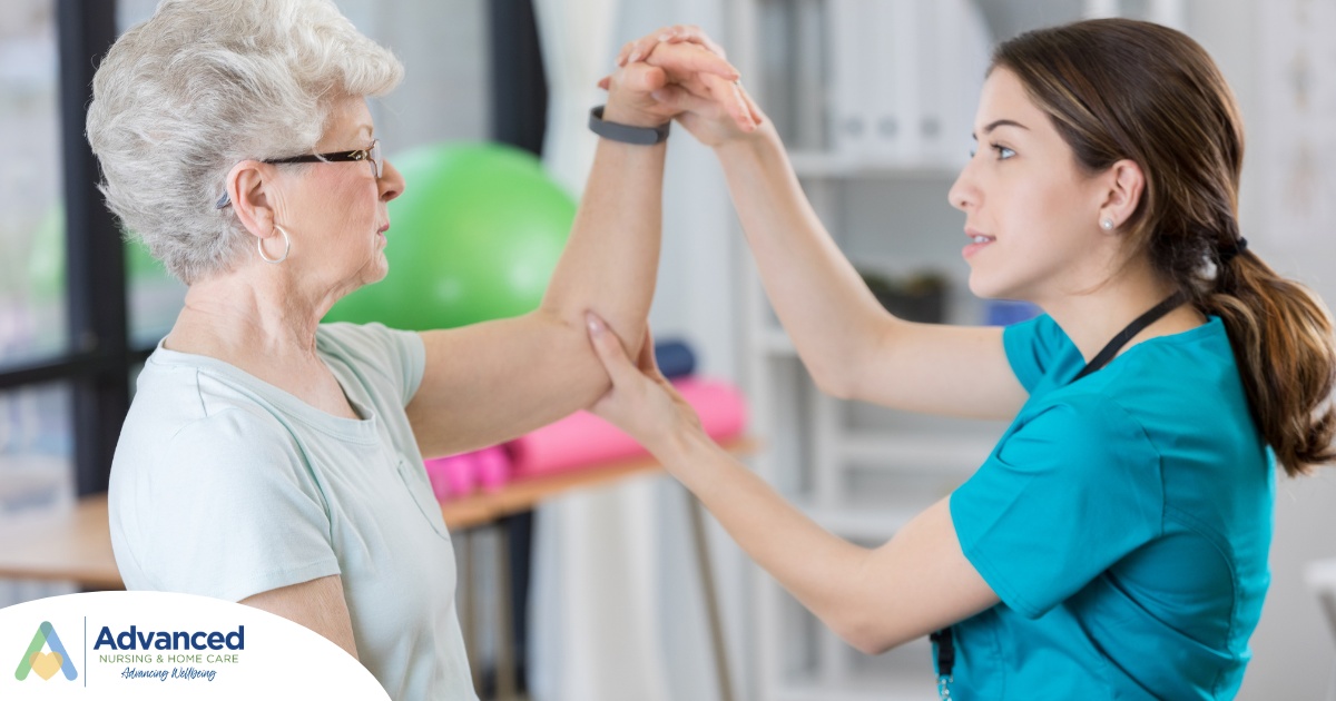 A physical therapist helps a senior patient, representing what National Physical Therapy Month aims to highlight.